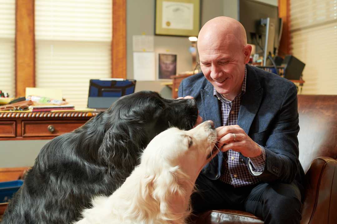 Brian Davis with his two dogs.