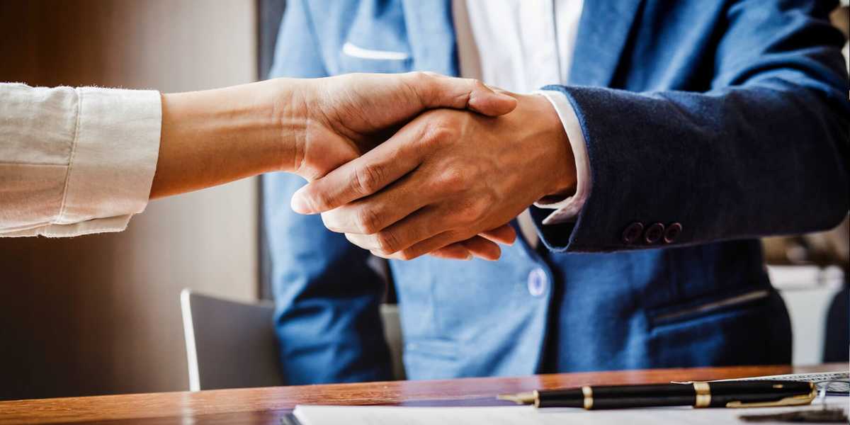 Lawyer Shakes hands with Client